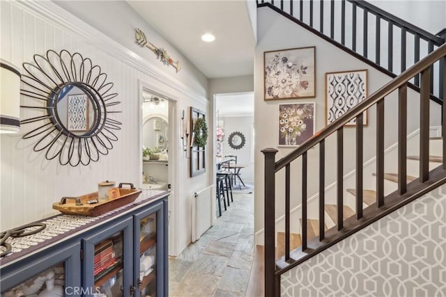 33971 Lily Rd, Yucaipa, CA 92399 - foyer entrance featuring stairway, bar area, light stone finish floors, and recessed lighting