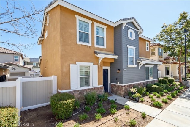 33971 Lily Rd, Yucaipa, CA 92399 - view of front of home featuring stone siding and stucco siding
