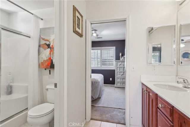 33971 Lily Rd, Yucaipa, CA 92399 - ensuite bathroom with a shower stall, vanity, and tile patterned floors