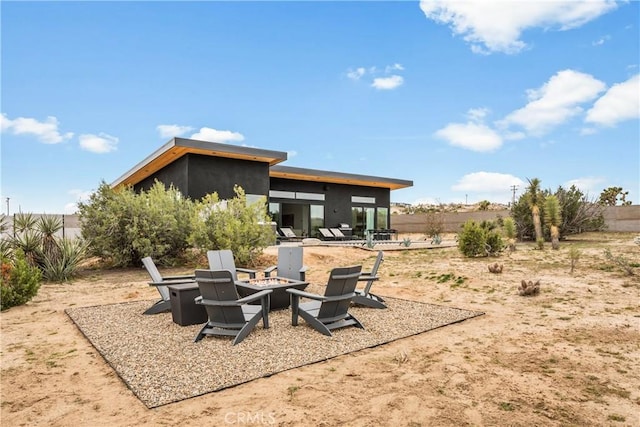 view of yard featuring a patio and a fire pit