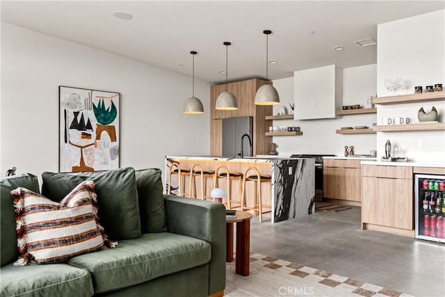 living room featuring wine cooler, visible vents, wet bar, and finished concrete flooring