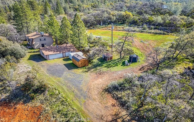 aerial view with a wooded view