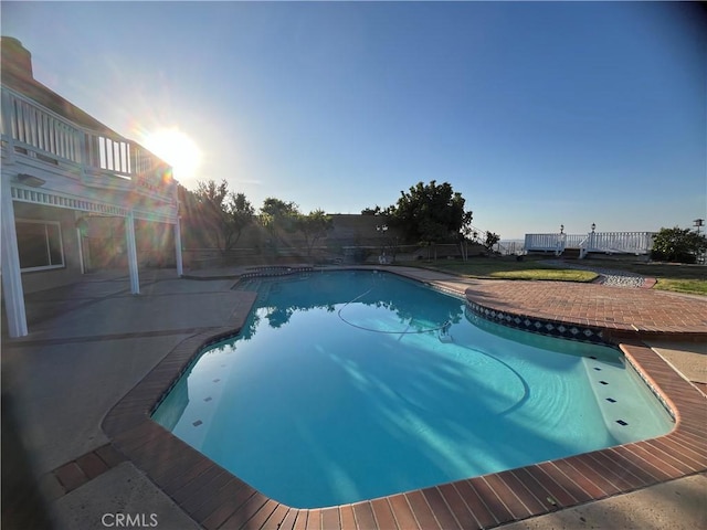 pool featuring a patio area