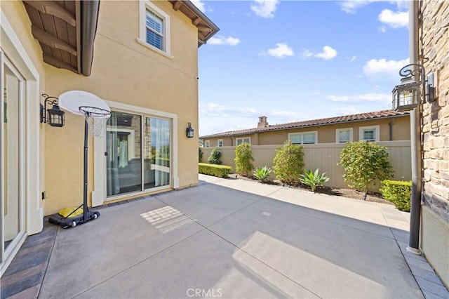 view of patio / terrace with fence