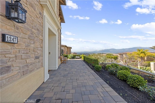 view of patio with a mountain view