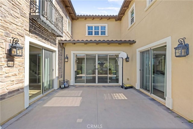 view of patio / terrace with a balcony