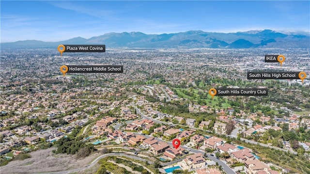 drone / aerial view with a mountain view and a residential view