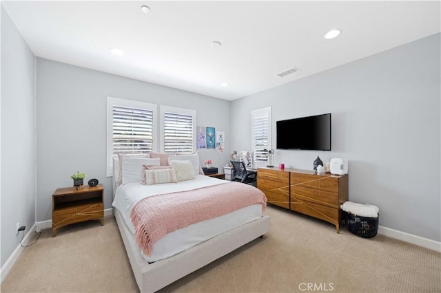 bedroom with recessed lighting, visible vents, baseboards, and light colored carpet