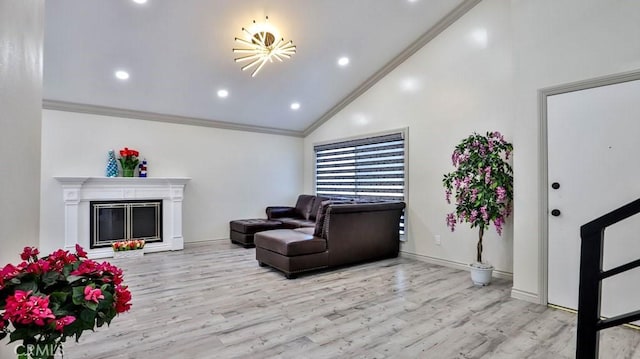 living room featuring baseboards, a fireplace, crown molding, and light wood finished floors