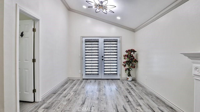 unfurnished dining area with french doors, baseboards, light wood-style floors, and crown molding