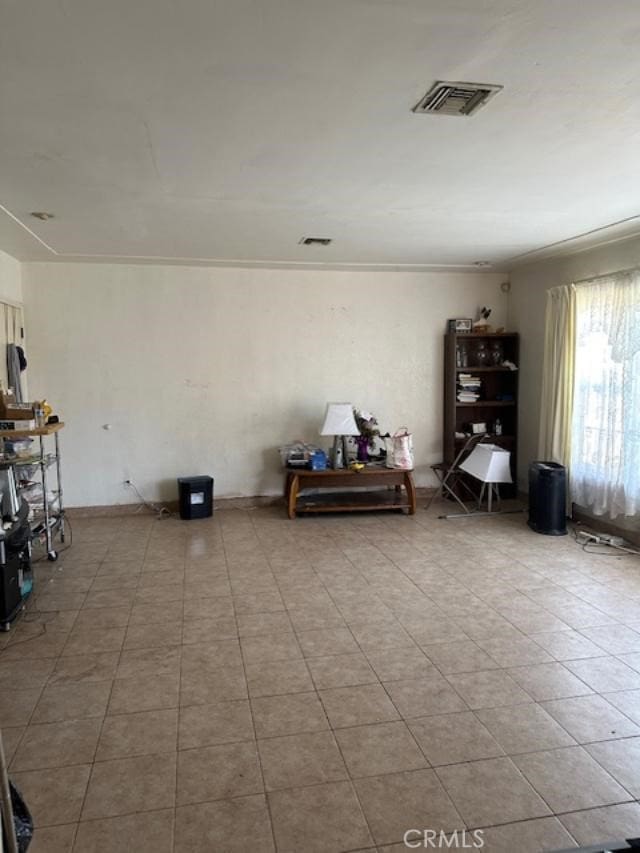 miscellaneous room with tile patterned floors and visible vents