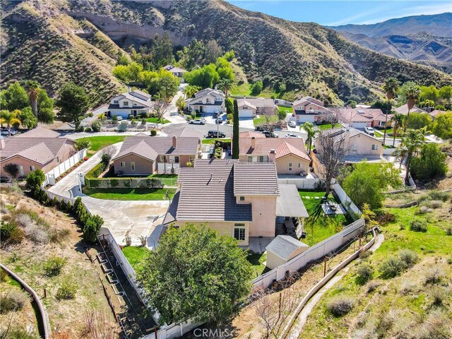 bird's eye view featuring a residential view and a mountain view