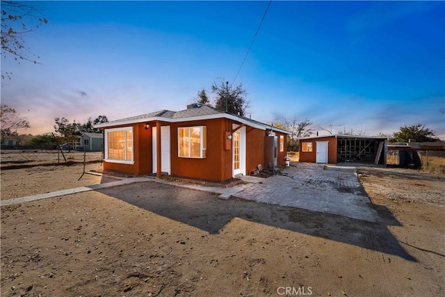 43331 Fairglen Rd, Lancaster, CA 93535 - exterior space with an outbuilding and stucco siding