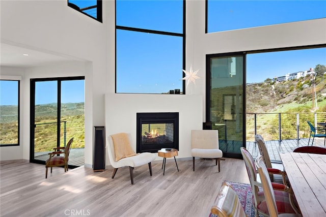 interior space featuring a warm lit fireplace