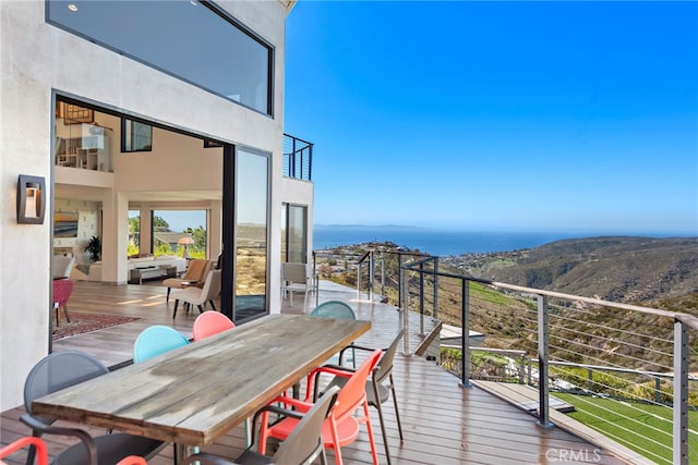 balcony featuring outdoor dining space