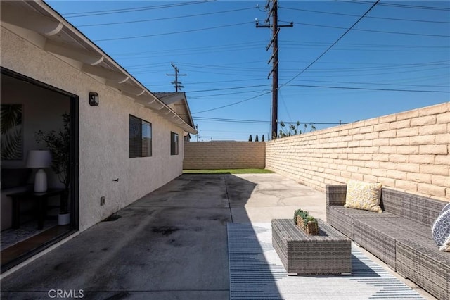 view of patio with a fenced backyard