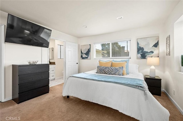 bedroom featuring recessed lighting, baseboards, and light carpet