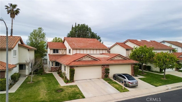 view of front of property with a tiled roof, concrete driveway, a front yard, and board and batten siding