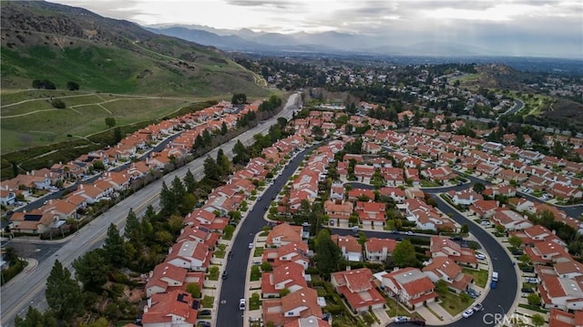 bird's eye view featuring a residential view and a mountain view