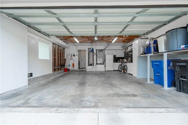 garage with freestanding refrigerator