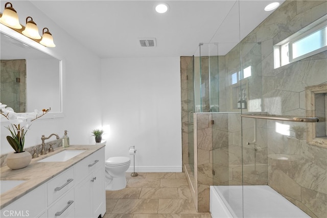 full bath featuring visible vents, a shower stall, toilet, double vanity, and a sink