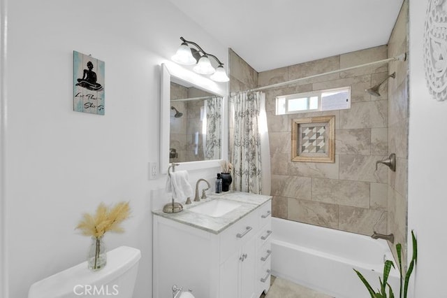 full bathroom with shower / tub combo with curtain, vanity, and toilet