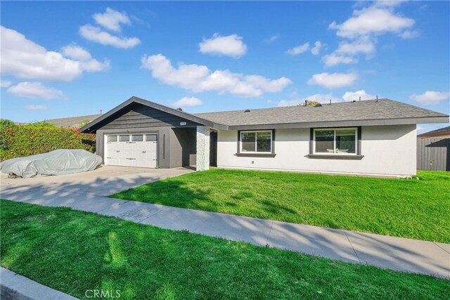 single story home with a shingled roof, a front lawn, concrete driveway, stucco siding, and a garage