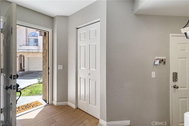 14039 Astoria St Unit 120, Sylmar, CA 91342 - entrance foyer featuring light wood-style floors and baseboards
