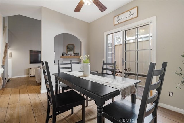 14039 Astoria St Unit 120, Sylmar, CA 91342 - dining room with a ceiling fan and light wood-style floors