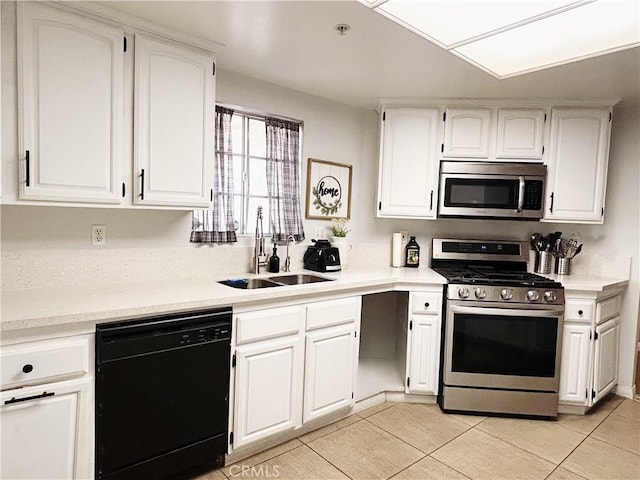 14039 Astoria St Unit 120, Sylmar, CA 91342 - kitchen with appliances with stainless steel finishes, white cabinetry, light tile patterned floors, and light countertops