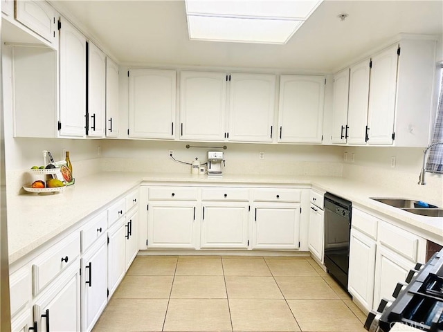 14039 Astoria St Unit 120, Sylmar, CA 91342 - kitchen with black dishwasher, light tile patterned flooring, and white cabinetry