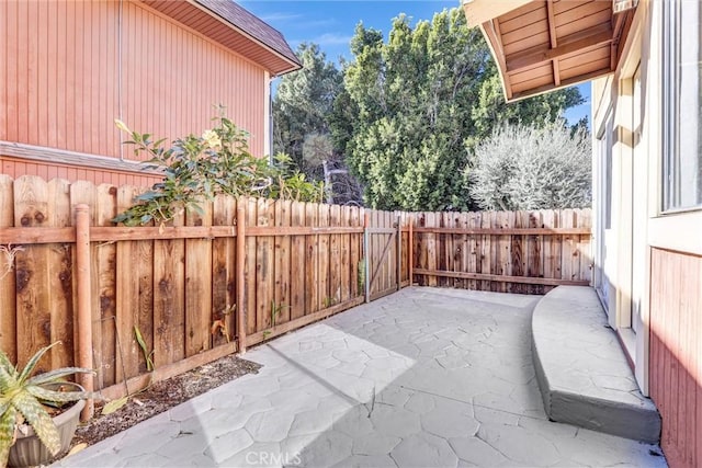 view of patio / terrace featuring fence