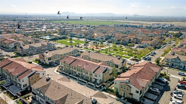 bird's eye view featuring a mountain view and a residential view