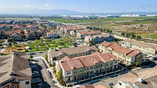 bird's eye view featuring a mountain view and a residential view