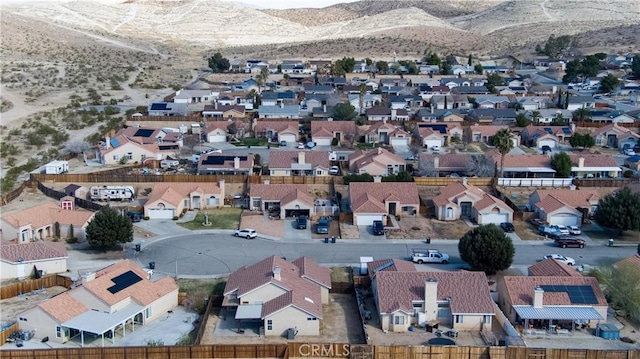 aerial view with a mountain view and a residential view