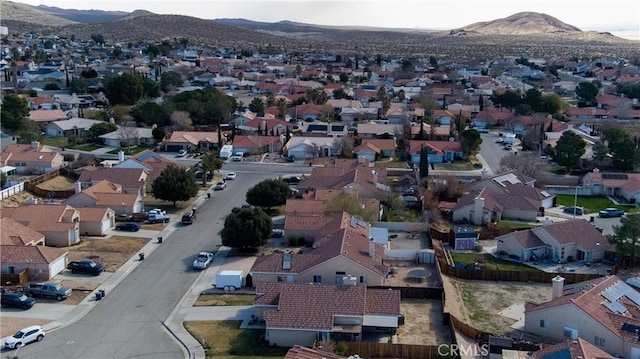 bird's eye view featuring a residential view and a mountain view