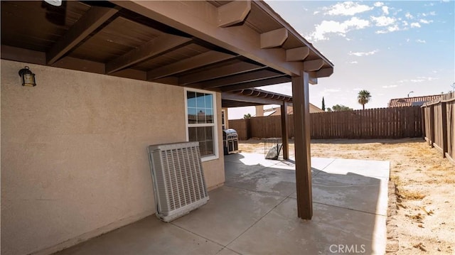 view of patio / terrace with a grill and a fenced backyard