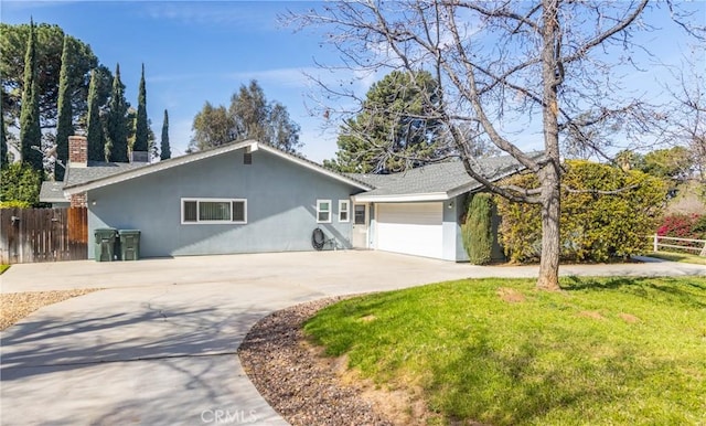 23187 Glendora Dr, Grand Terrace, CA 92313 - view of front of house with driveway, a chimney, stucco siding, and an attached garage