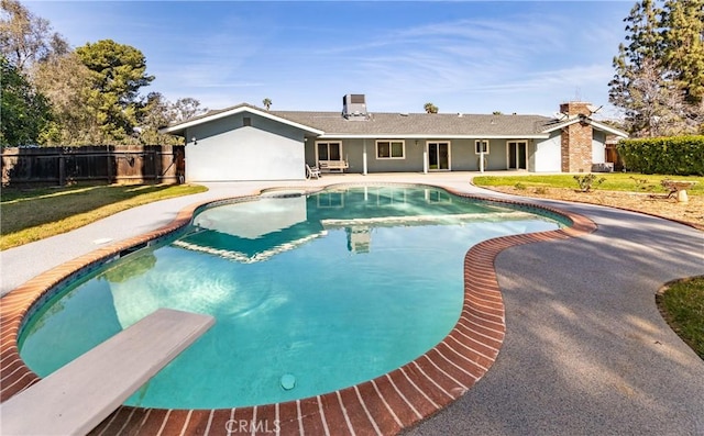 23187 Glendora Dr, Grand Terrace, CA 92313 - view of pool featuring a patio area, fence, and a diving board