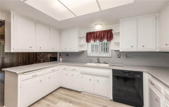 23187 Glendora Dr, Grand Terrace, CA 92313 - kitchen featuring black dishwasher, open shelves, a sink, and white cabinets