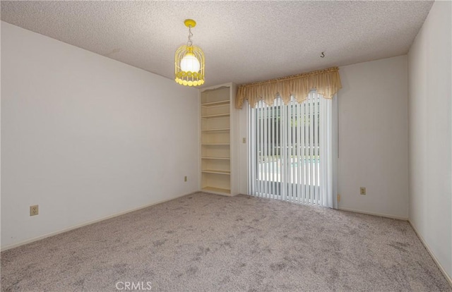 23187 Glendora Dr, Grand Terrace, CA 92313 - unfurnished room featuring carpet and a textured ceiling
