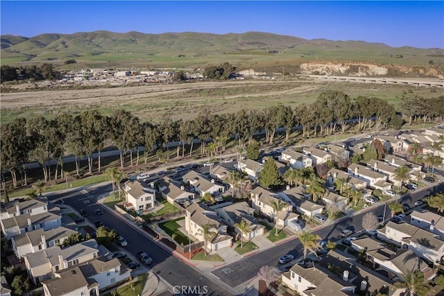 bird's eye view with a mountain view and a residential view