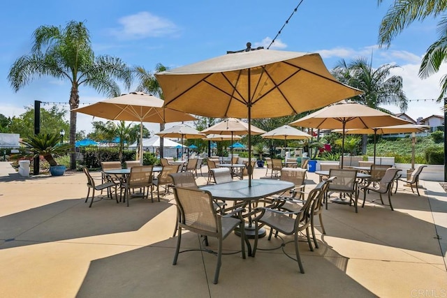 view of patio featuring fence