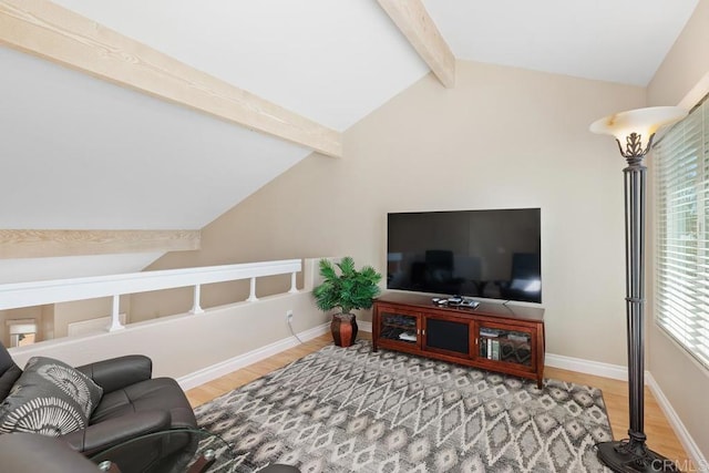 living room with baseboards, wood finished floors, and vaulted ceiling with beams