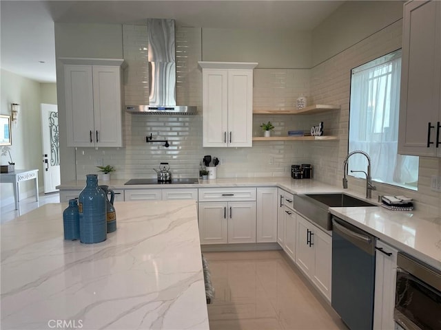 kitchen featuring a sink, white cabinets, wall chimney range hood, black electric cooktop, and dishwasher