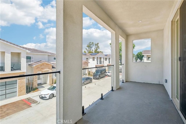balcony featuring a residential view