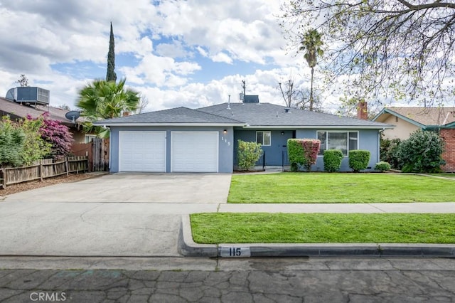 single story home with stucco siding, driveway, fence, an attached garage, and a front yard