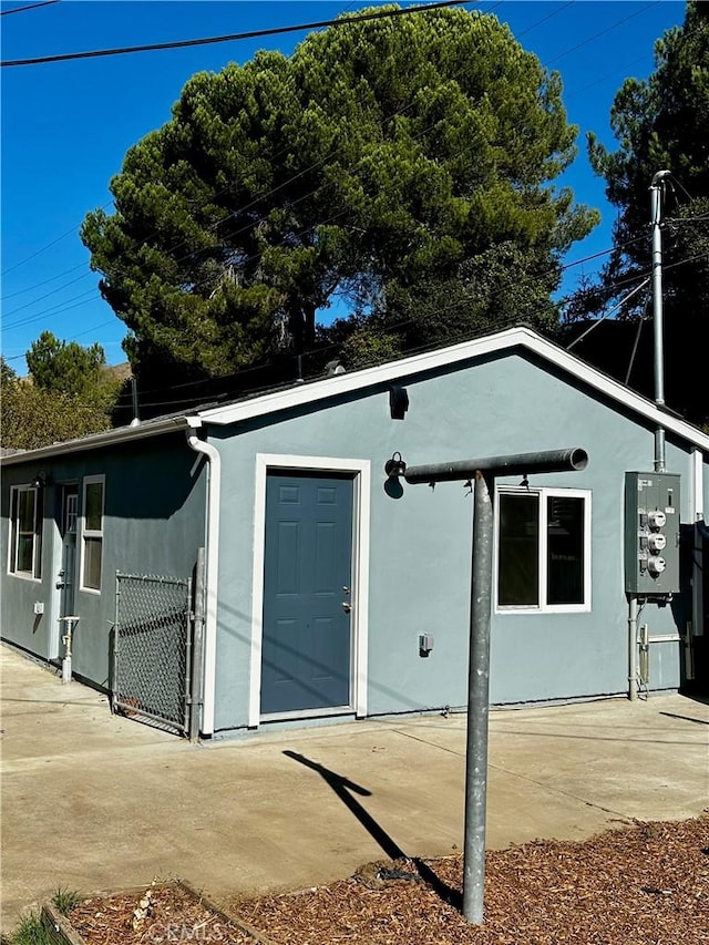 exterior space featuring stucco siding