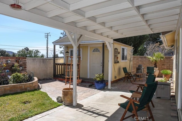 view of patio / terrace with fence