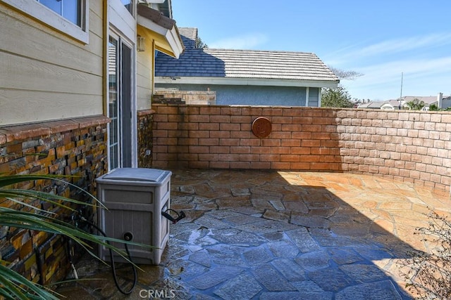 view of patio / terrace with fence